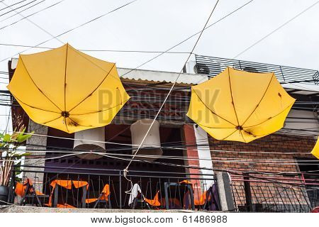 Street Decorated With Yellow Umbrellas