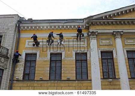 Repair Of The Facade Of A Historic Building Migrant Workers