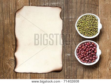 Raw Organic Azuki And Mung Beans And Old Paper