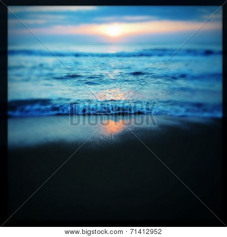 Instagram filtered image of the sunrise and surf on the Outer Banks shorline