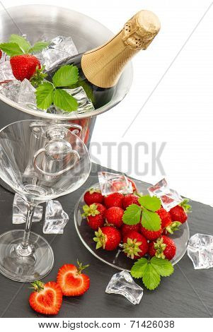 Champagne, Two Glasses And Strawberries