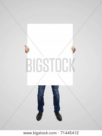 Man Holding Poster
