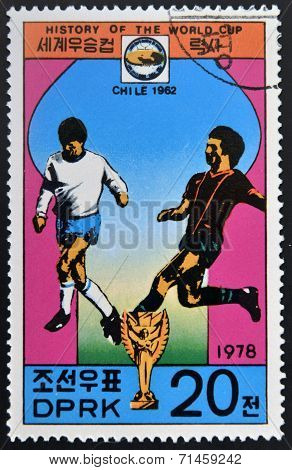 NORTH KOREA - CIRCA 1978: a stamp printed in North Korea shows football players World football cup