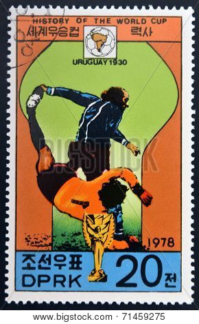 NORTH KOREA - CIRCA 1978: a stamp printed in North Korea shows football players World football cup