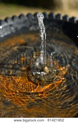 Water Flowing From A Faucet