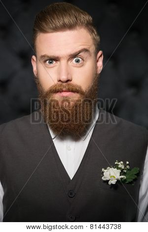 Serious looking stylish man with beard
