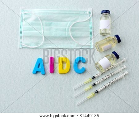 Medicines with word Aids on light background