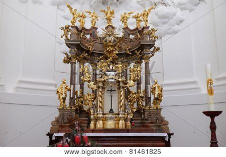 SALZBURG, AUSTRIA - DECEMBER 13: Altar in Collegiate church in Salzburg on December 13, 2014.