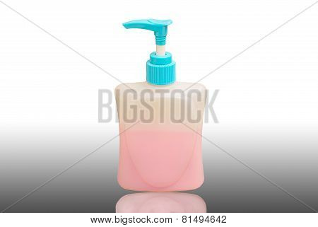 Old hand washing liquid pump bottle with dirt or debris .
