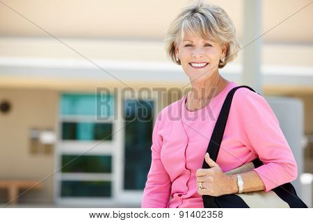Mature student outdoors