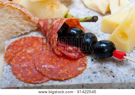 Mix Cold Cut On A Stone With Fresh Pears