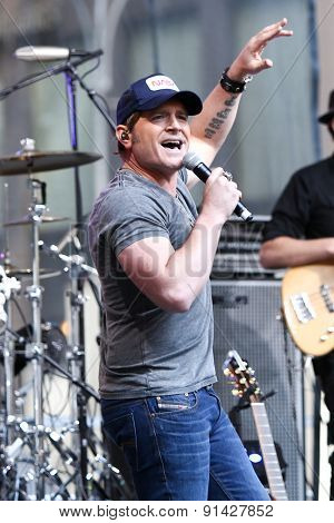 NEW YORK - MAY 22: Singer Jerrod Niemann performs at Fox and Friends' All-American Summer Concert Series on the corner of 48th Street and 6th Avenue on May 22, 2015 in New York City.