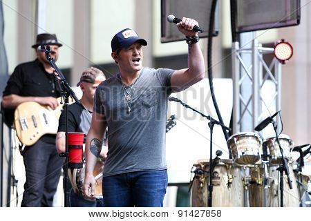 NEW YORK - MAY 22: Singer Jerrod Niemann performs at Fox and Friends' All-American Summer Concert Series on the corner of 48th Street and 6th Avenue on May 22, 2015 in New York City.