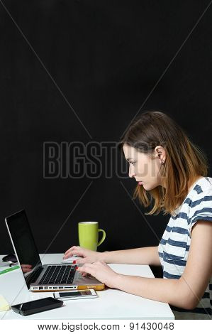 Young girl with laptop, writer, small business, education, blogger cconcept