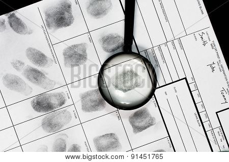 Fingerprint on police fingerprint card.