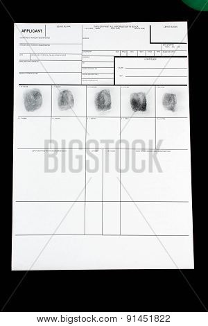 Fingerprint on police fingerprint card.