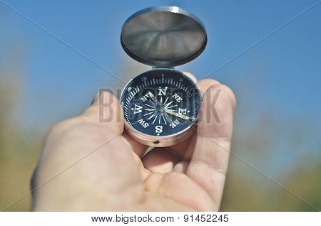 Compass In Hand.
