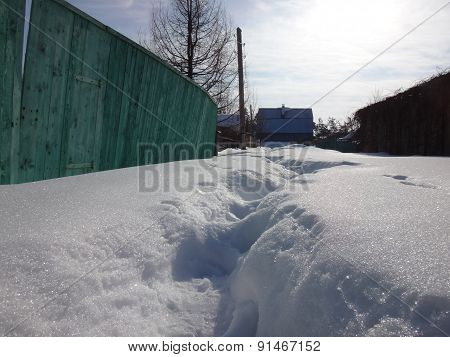 Winter village in sunny day