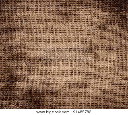 Grunge background of chamoisee burlap texture