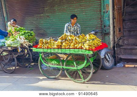 Man Sells Bananas At The Old Vegetable Street Market In Delhi