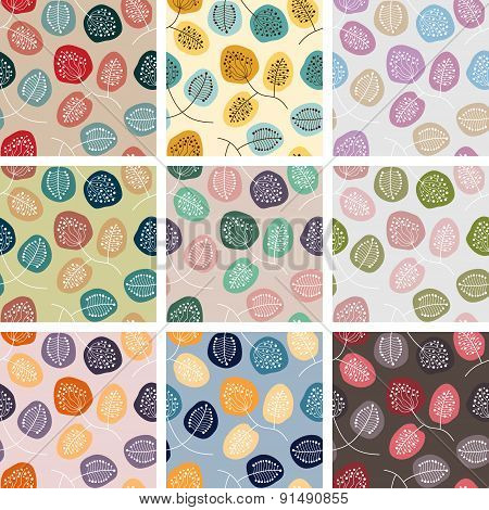 Set Of Seamless Patterns With Abstract Flowers In Different Colors.