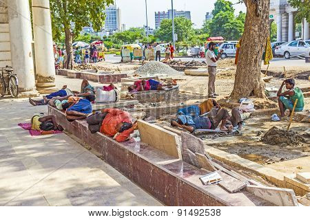 Construction Workers Relax At The Connaught Place