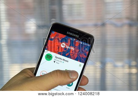MONTREAL CANADA - MARCH 20 2016 - Spotify mobile application on Samsung S5's screen. Spotify is a digital music service
