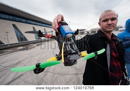Saint-Petersburg, Russia - March 26, 2016: Flying drone assembled on their own. Trial starts drone to drone on racing competitions.