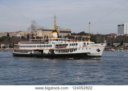 ISTANBUL TURKEY - MARCH 06 2016: Sehir Hatlari ferry passing from European side to Asian side of Istanbul. Sehir Hatlari was established in 1844 and now carry 150000 passengers a day.