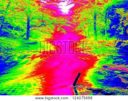 Mossy boulder and water level in shadows of trees. Cold water of mountain river in infrared photo. Amazing thermography.