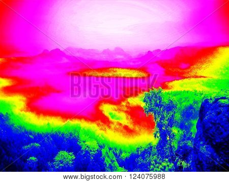 Rock with trees above misty valley. Fantastic infrared scan of hilly landscape. Hill and forest with colorful fog, hot sunny sky above.