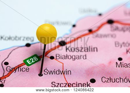 Photo of pinned Swidwin on a map of Poland. May be used as illustration for traveling theme.