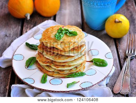 Vegetarian pancakes without eggs and sugar with coconut milk from squash and pumpkin.