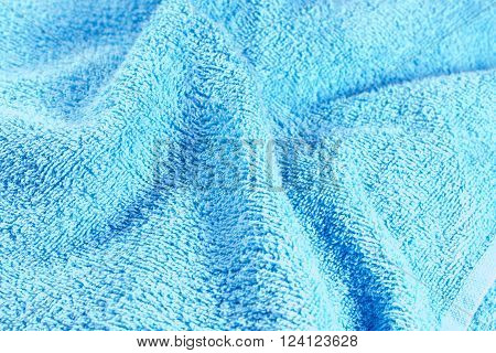 crumpled blue towel texture as a background