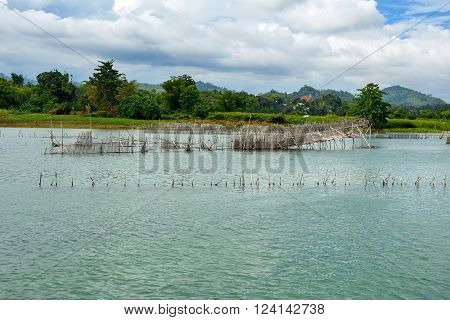 Fish Farm And Hatchery On Poso River Near Tentena. Indonesia