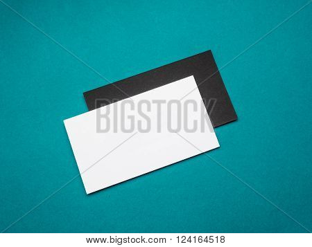 Two Business cards mockup on emerald background