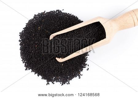 Heap Of Black Sesame On Wooden Spoon
