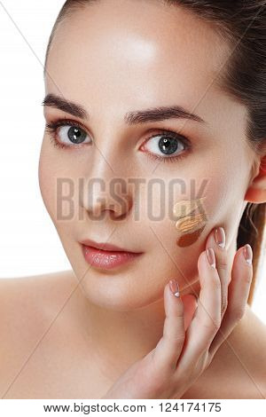 Beauty Girl Try to Different tones of Foundation Concealer. Natural Makeup for Brunette Woman with Beautiful Face. Makeover. Perfect Skin. Applying Make-up. Ideal for commercial
