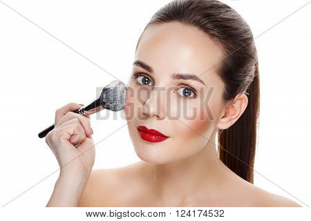 Beauty Girl With Brush Finish Makeup Apply Highlighter. Bright Makeup For Brunette Woman With Beauti
