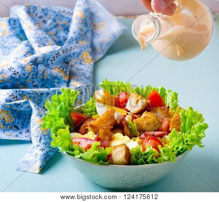 Cobb Salad with sauce . selective focus