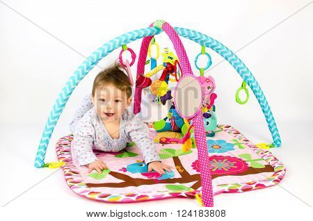 Baby Girl Palying In An Activity Gym