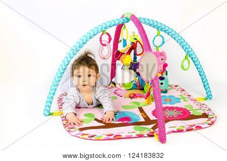 Baby Girl Palying In An Activity Gym