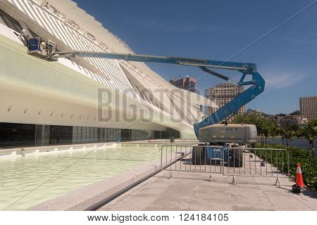 Rio de Janeiro, Brazil - March 21, 2016: Maintenance of the Museum of Tomorrow. Workers are cleaing the building.