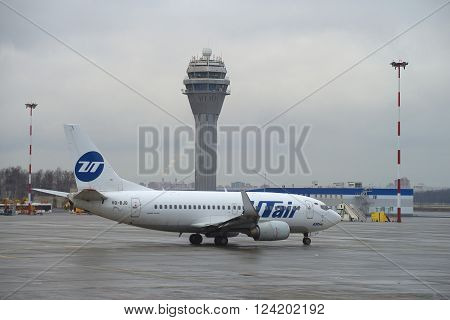 ST. PETERSBURG, RUSSIA - DECEMBER 12, 2015: A Boeing 737-500 (VQ-BJQ) UTair aviation before flying to Pulkovo airport