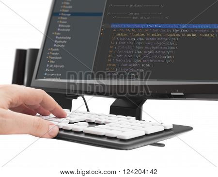 developer working on source codes on computer at office