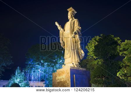 HANOI, VIETNAM - JANUARY 10, 2016: The monument of Emperor Ly Thai To in the night park. The landmark of Hanoi, Vietnam