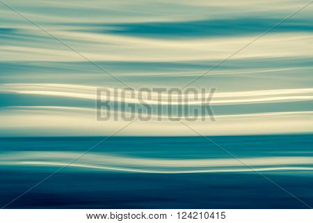 Retro effect coastal abstract wavy clouds over horizon sea and beach Waitarere Beach Levin New Zealand
