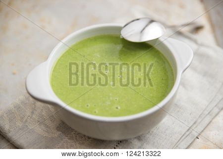 Healthy home made green soup in a bowl