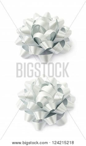 Decorational silver ribbon gift bow isolated over the white background, set collection of two diffirent foreshortenings
** Note: Shallow depth of field