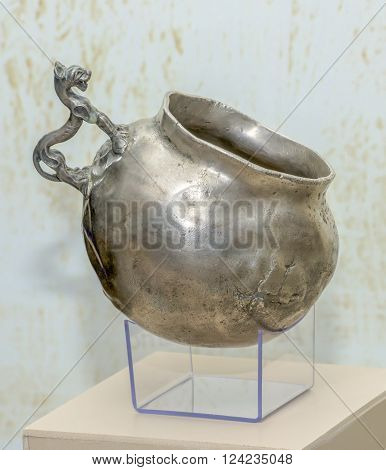 AZOV RUSSIA- SEPTEMBER 20 2015: Cult utensils. Cup with zoomorphic handle. 1st century AD Silver in the museum - reserve on September 20;2015 in Azov